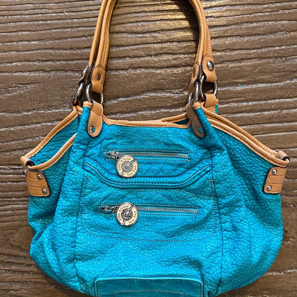 Very cute turquoise Kathy Van Zeeland purse/handbag